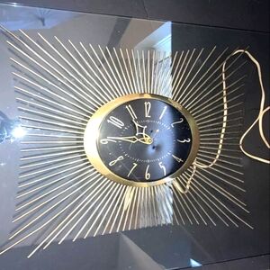 Vintage Mid Century Modern GE Starstruck hanging wall clock, all brass